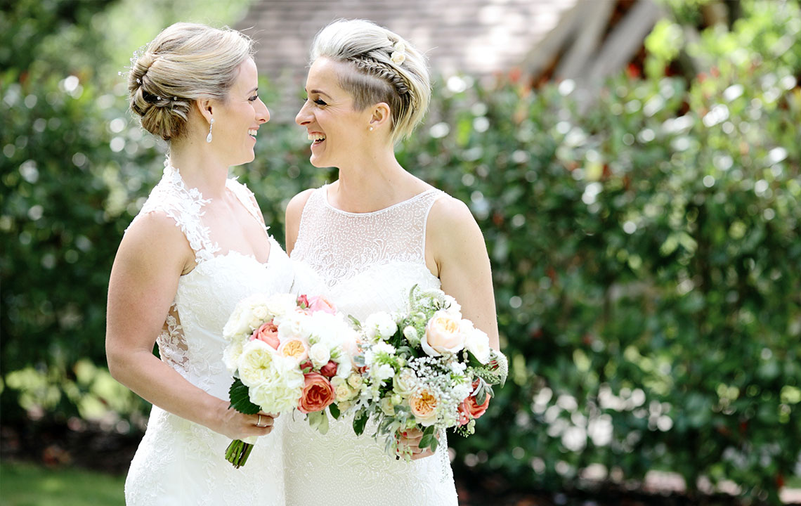 two-brides-smiling-dasha-caffrey-photography