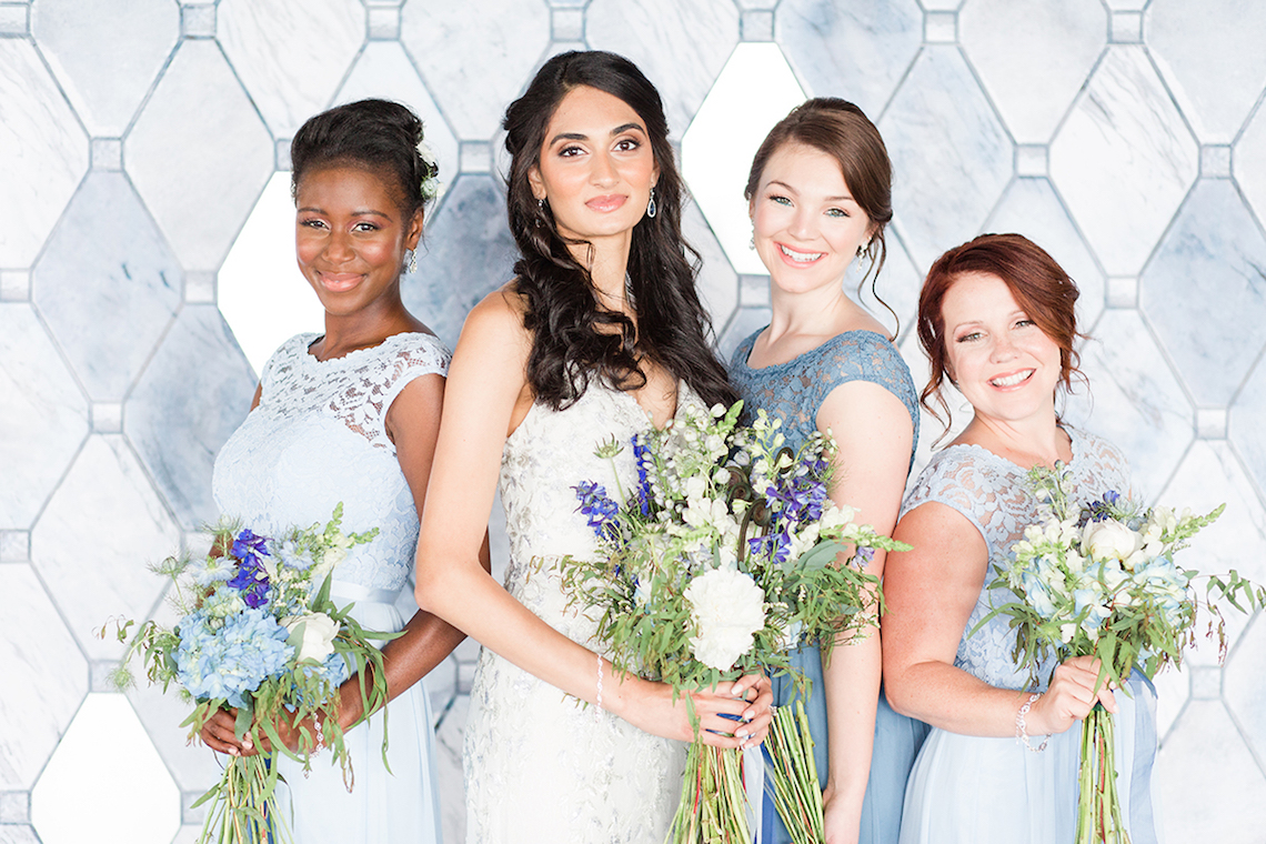 Bride and bridesmaids in blue dresses