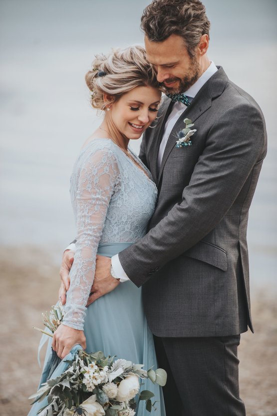 Stormy Scandinavian Wedding Inspiration Featuring a Dramatic Blue Gown | Snowflake Photo 25