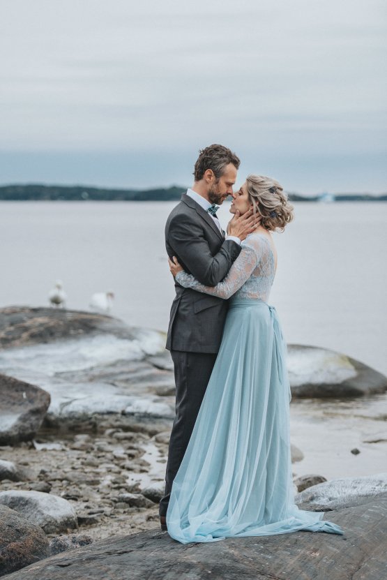 Stormy Scandinavian Wedding Inspiration Featuring a Dramatic Blue Gown | Snowflake Photo 41