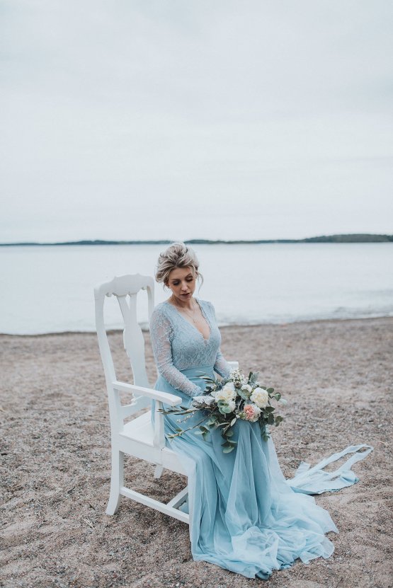 Stormy Scandinavian Wedding Inspiration Featuring a Dramatic Blue Gown | Snowflake Photo 47