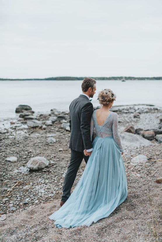 Stormy Scandinavian Wedding Inspiration Featuring a Dramatic Blue Gown | Snowflake Photo 48