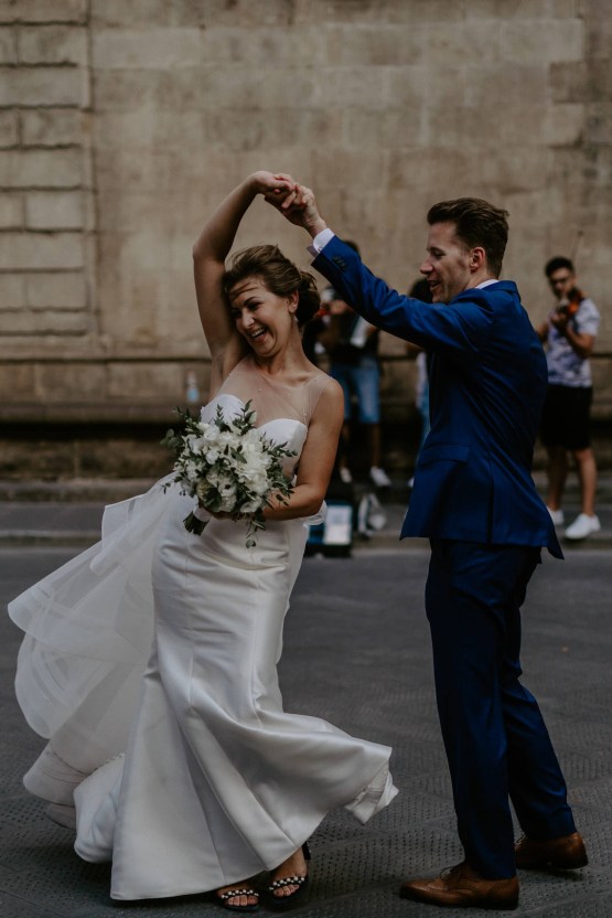 Bride and Groom Dancing in the Piazza in Florence Italy