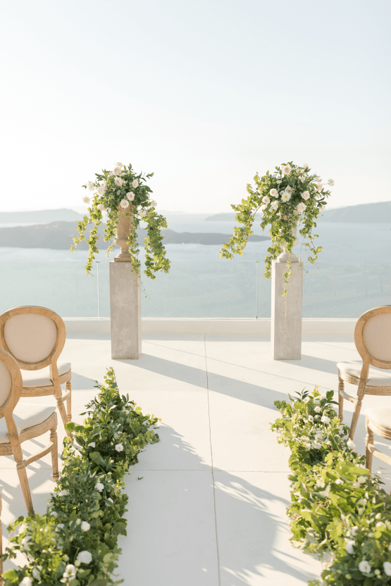 Pale Blue Greek Micro Wedding on the Cliffs of Santorini – Kimonas Photography 16