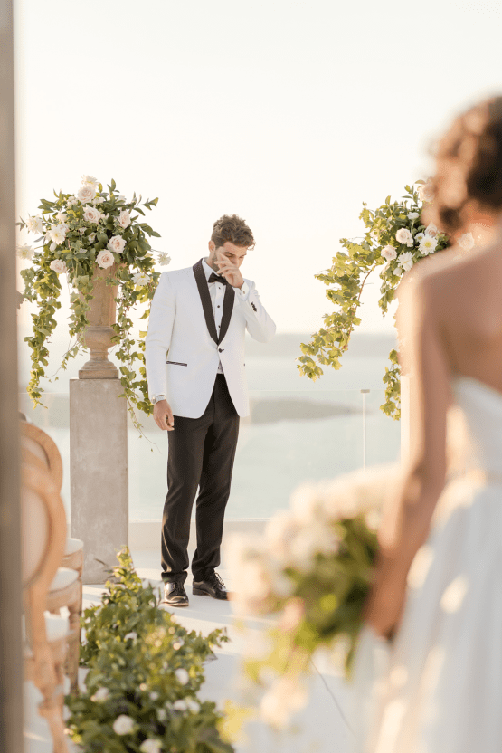 Pale Blue Greek Micro Wedding on the Cliffs of Santorini – Kimonas Photography 19