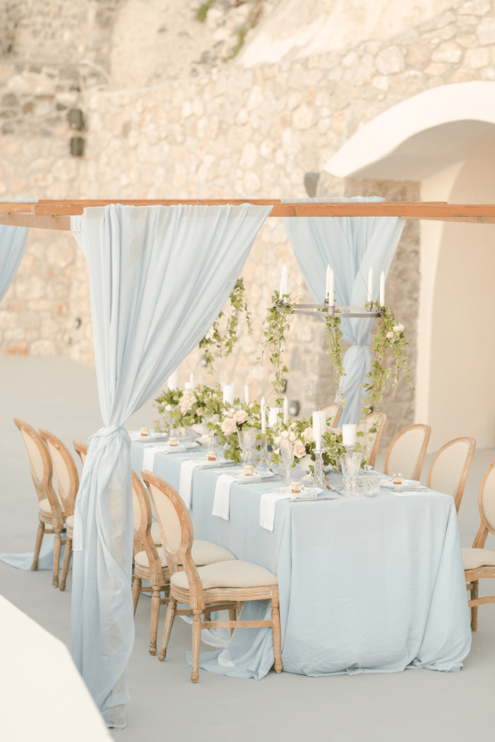 Pale Blue Greek Micro Wedding on the Cliffs of Santorini – Kimonas Photography 44